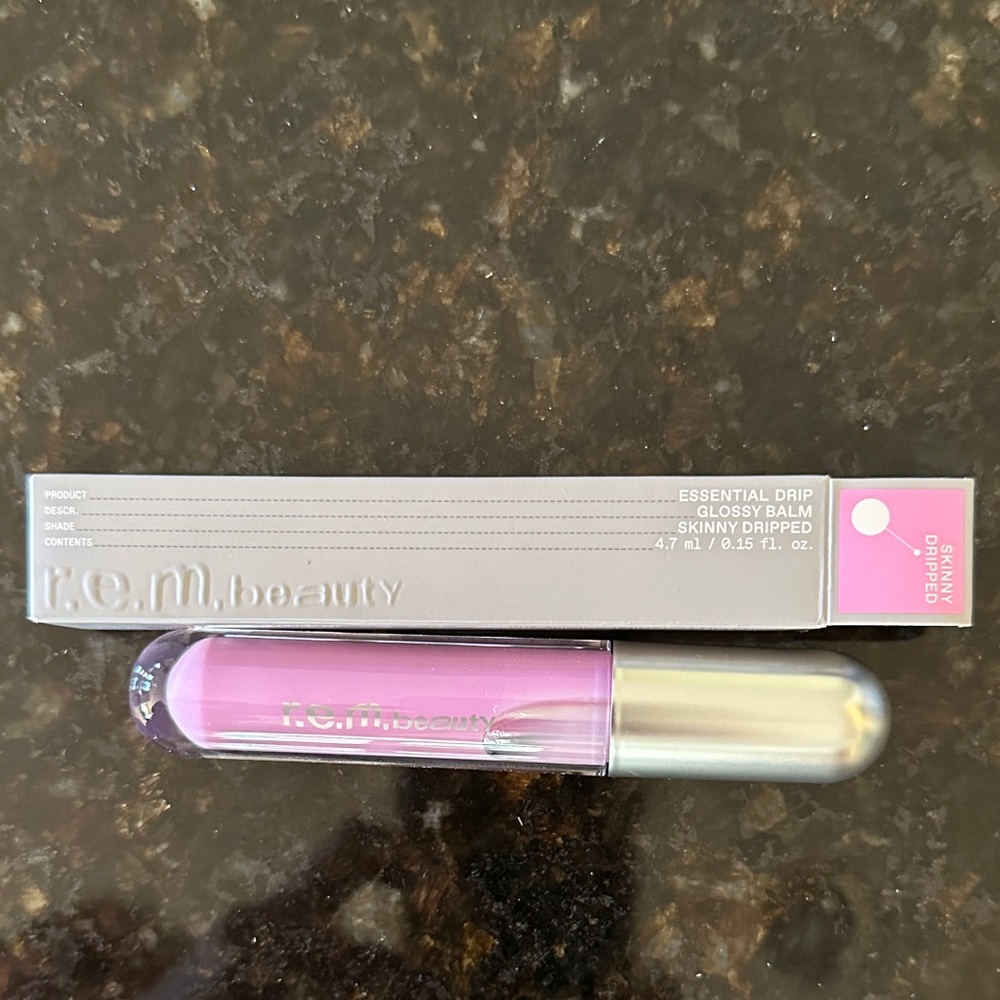 R.E.M Beauty Essential Drip Glossy Balm in Skinny Dipped Pink
